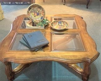 Another coffee table with glass top inserts
