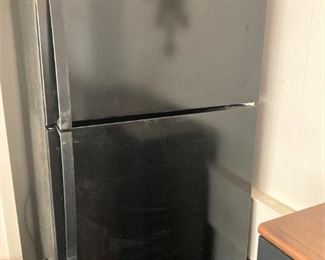 Black Whirlpool refrigerator