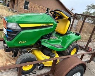 Super JD X300 zero turn mower w/new belt, blades and just tuned up by JD dealer.