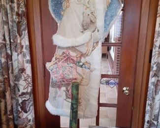 Christmas paper, gift boxes, gift bag and a (approximately) 56" tall santa