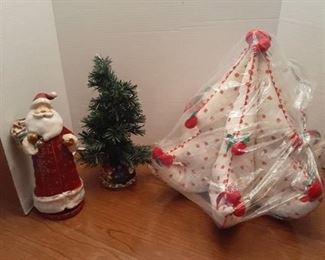 Christmas decor. Santa has something broken off his bag.