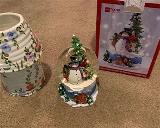 Musical snowman snow globe and ceramic candle holder