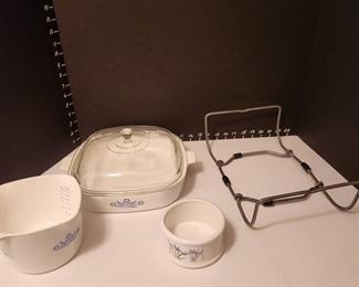 Corning ware casserole dish (lid has chip), measuring dish and metal rack