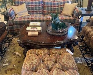 Great coffee table and accessories, matching ottoman for armchairs.  Lots of rugs!
