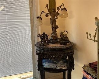Very large marble top occasional table. Vintage lamp with small bronzes