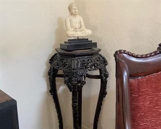 Asian marble top plant stand with Buddha .