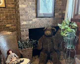 Large stuffed bear, plant stands