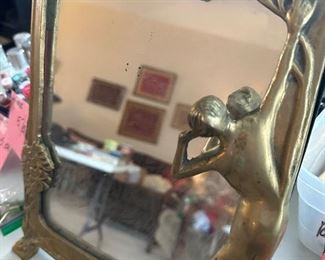 Heavy art deco brass mirror 