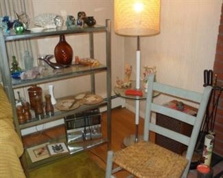 Antique thumb back chair, mid century lamp table, lots of bric-a-brac.