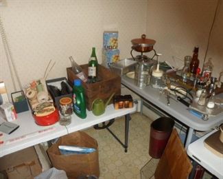 Lots of kitchen stuff, old bottles, sewing items, jar of buttons, etc.