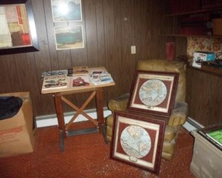 Framed maps, and car & motorcycle brochures.