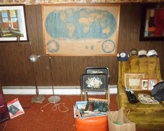 World map, art work, TV Tables, old lamps, Hoover Vacuum, Old photos.