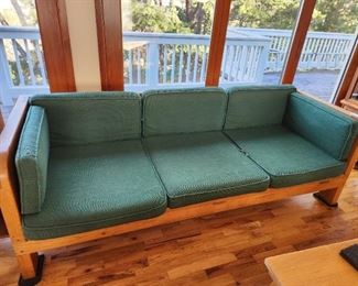 VintageModern Sofa which also folds out for a sleep over. 
