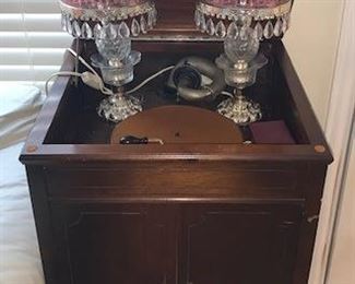 Victrola Consolette #19347 "Talking Machine" WORKS has hand crank and needles. (at check out) Also various crystal and Tiffany style lamps throughout house, BEAUTIFUL.