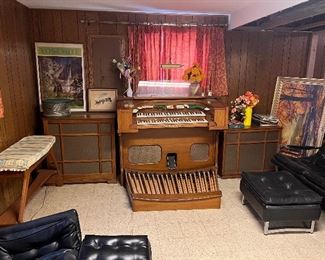 Organ and vintage leather coach with ottoman
