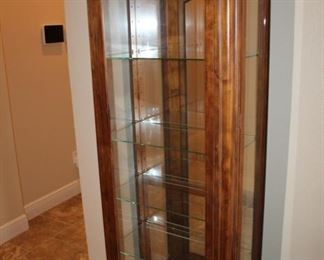 lighted curio cabinet, side door