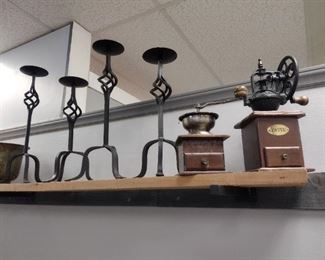 wrought iron candle stands and coffee grinders. 