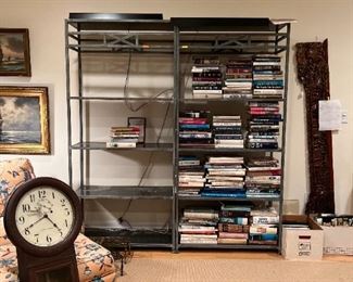 Metal shelves with stone inserts, Lots of great books including cookbooks, french books, Art and more