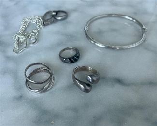 Lots of fashion, jewelry, and some silver.