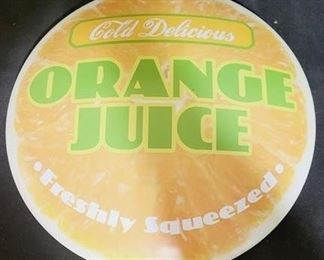 73 - 12" Metal orange juice button sign
