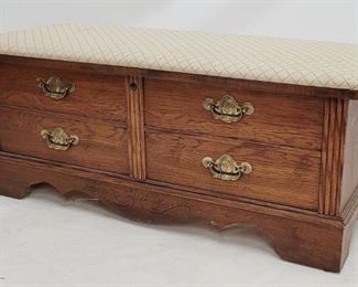 1648 - Lane lift top cedar chest, upholstered top one back leg has damage, is shorter 18 x 45 x 17

