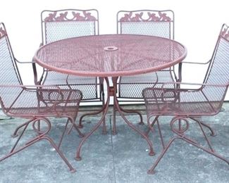 6168 - Metal patio table w/ 4 spring rocking chairs table 28 x 42 chairs 35 x 24 x 18
