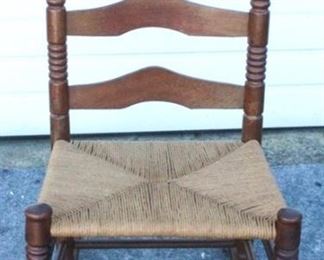 6203 - Vintage spool carved & rush seat rocking chair 32 x 18 x 15
