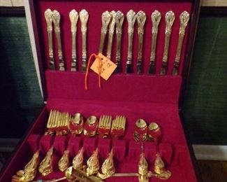 set of 12 gold tone silverware, we have gold chargers too