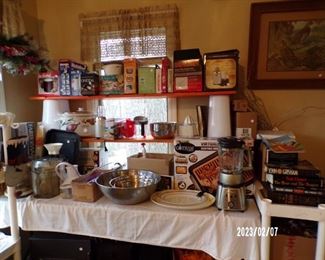 new items in boxes, mostly kitchen items