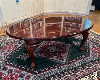Oval wood with glass protective topped coffee table
