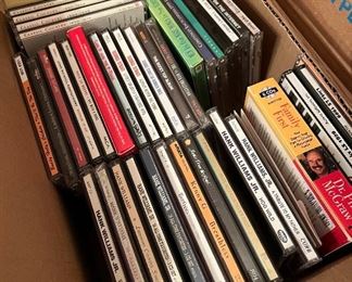 Lots of CDs, DVDs, cassettes, and VHS 