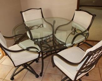 Modern glass and metal dining set