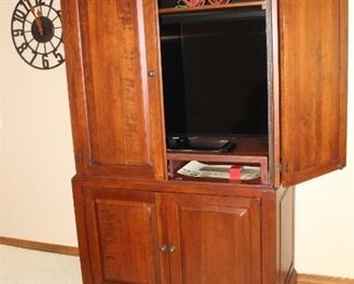 Works as a media cabinet or clothing storage