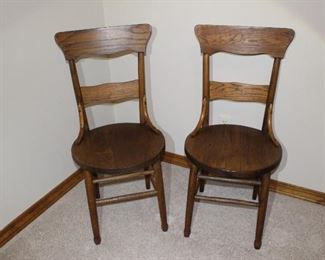 Pair of antique oak solid seat chairs