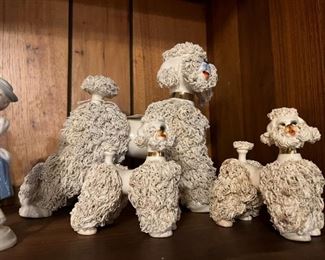 Close up of poodle figurines