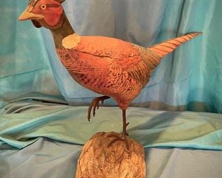 Hand-carved wooden pheasant made by Tom Taber and Hersey Kyle Jr.