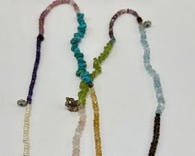New Turquoise, Rose Quartz, Blue Topaz, Seed Pearls & Citrine Necklace With Buddhist Charms, 18.5 Inch
Lot #: 25