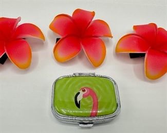 3 New Foam Flower Hair Clips Purchased At Four Seasons Hotel, Maui & Metal Flamingo Pill Box
Lot #: 99