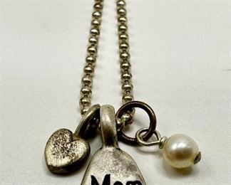 Sterling Silver Mom & Heart Pendants & Fresh Water Pearl On 16 Inch Chain, Marked 925
Lot #: 48