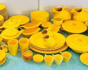12_____NOW $1,200 was $1,500 
Harlequin Homer Laughlin Yellow - 156 pieces