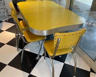 2_____$500 
MCM Retro Atomic chrome yellow kitchen table w/4 chairs + 1
58Lx36Wx30