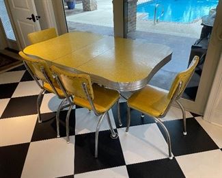 2_____$500 
MCM Retro Atomic chrome yellow kitchen table w/4 chairs + 1
58Lx36Wx30
