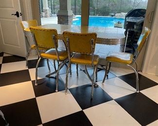 2_____$500 
MCM Retro Atomic chrome yellow kitchen table w/4 chairs + 1
58Lx36Wx30
