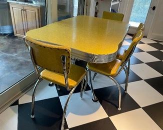 2_____$500 
MCM Retro Atomic chrome yellow kitchen table w/4 chairs + 1
58Lx36Wx30