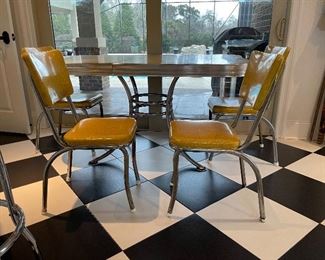 2_____$500 
MCM Retro Atomic chrome yellow kitchen table w/4 chairs + 1
58Lx36Wx30