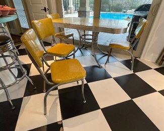 2_____$500 
MCM Retro Atomic chrome yellow kitchen table w/4 chairs + 1
58Lx36Wx30
