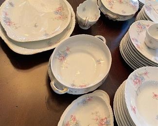 $275 Theodore Haviland Limoges France dining set. 12 dinner plate, 10 dessert or salad plates, 6 scallop saucers, 5 smooth saucers, 2 cups, 9 large soup bowls, 2 tea cups, 1 server, 1 large platter, 1 small platter, 7 salt, 1 butter, 1 creamer.