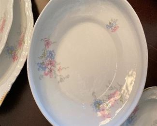 $275 Theodore Haviland Limoges France dining set. 12 dinner plate, 10 dessert or salad plates, 6 scallop saucers, 5 smooth saucers, 2 cups, 9 large soup bowls, 2 tea cups, 1 server, 1 large platter, 1 small platter, 7 salt, 1 butter, 1 creamer.