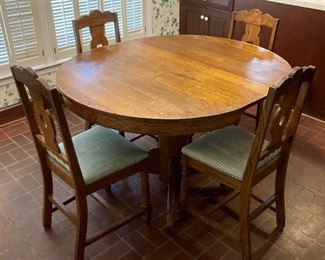Antique Oak pedestal table and six chairs