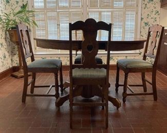 Antique Oak pedestal table and six chairs
